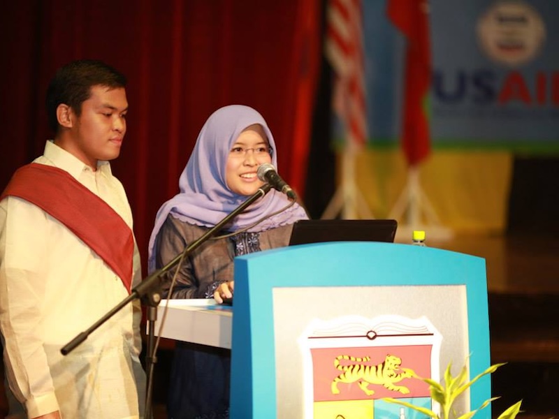 Giving a speech as a representative of the delegates