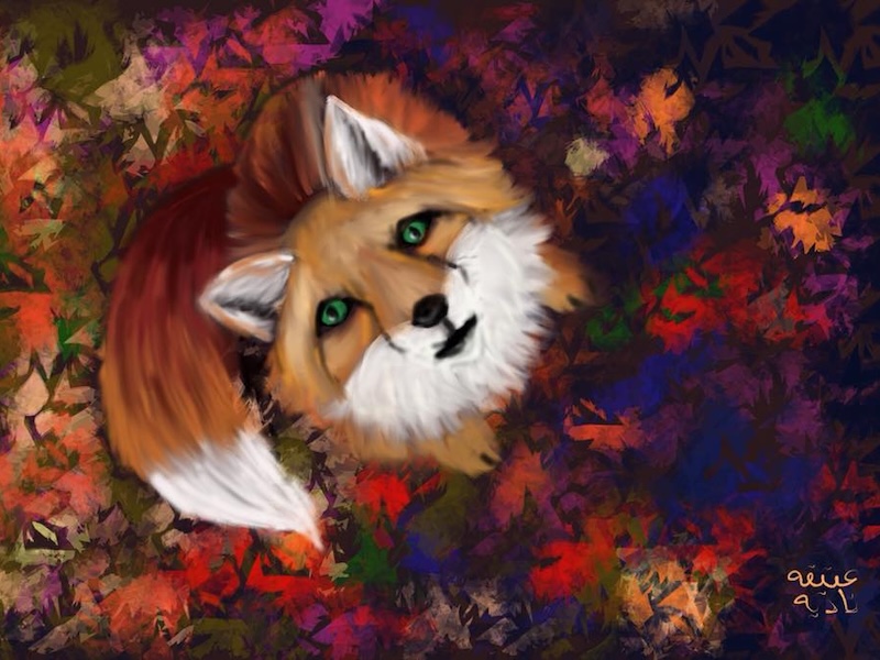A fox among autumn leaves