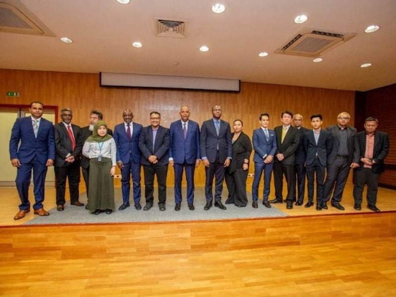 The team with Prime Minister Patrick Achi